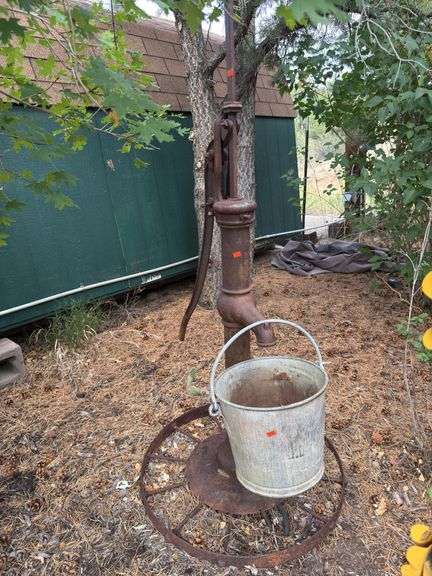 Water pump spout and bucket image