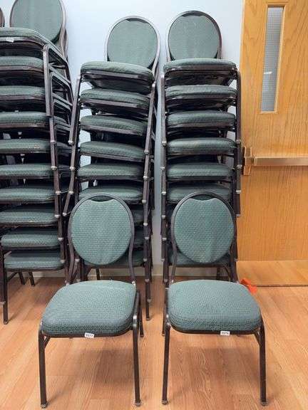 Event center chairs stack of 10 (bronze colored frame green Cushions image