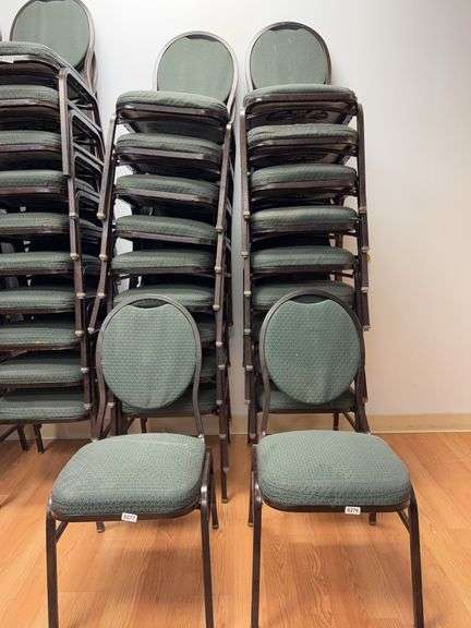 Event center chairs stack of 10 (bronze colored frame green Cushions image