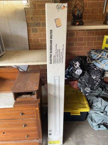 Electric baseboard heater new in box. image