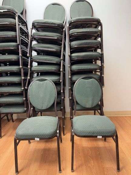 Event center chairs stack of 10 (bronze colored frame green Cushions image