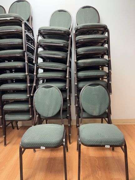 Event center chairs stack of 10 (bronze colored frame green Cushions image
