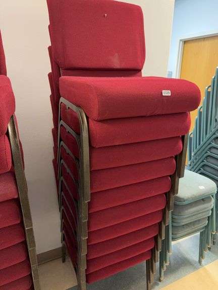 Stack of 10 event center chairs red cushions image