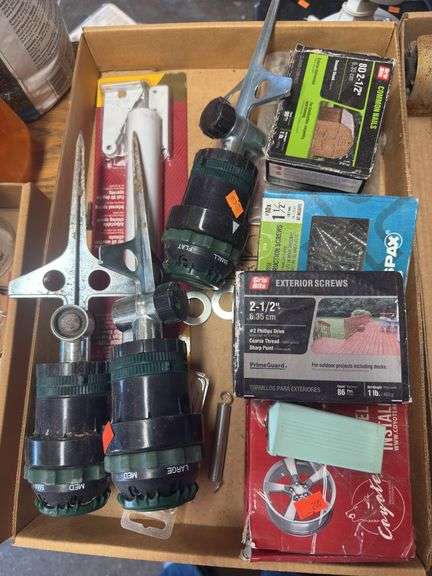 Lawn sprinklers, lug nuts, hardware. Ect… image