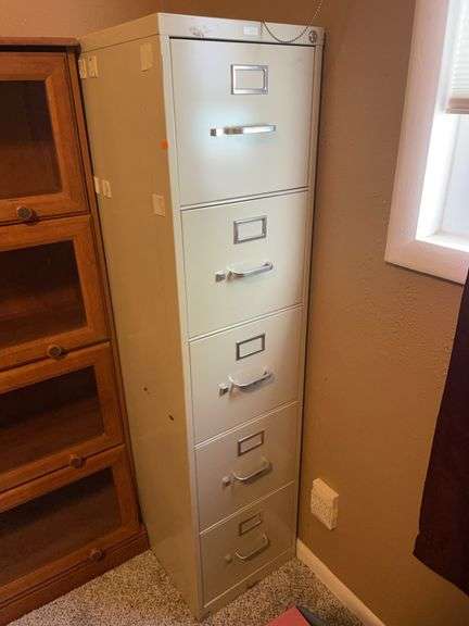 Five drawer metal filing cabinet image