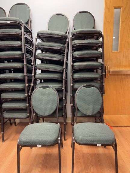 Event center chairs stack of 10 (bronze colored frame green Cushions image