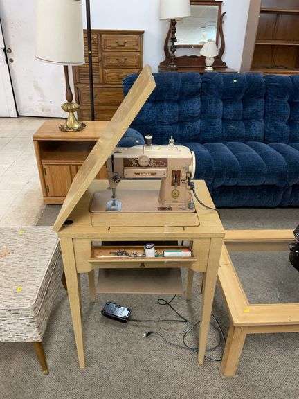 Singer, sewing machine with table and accessories image