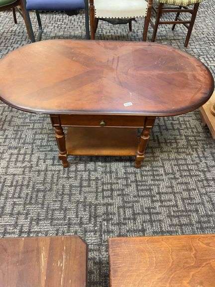 Wooden coffee table with drawer image