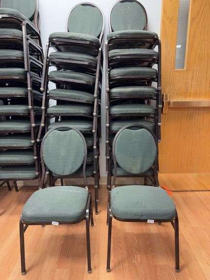 Event center chairs stack of 10 (bronze colored frame green Cushions image