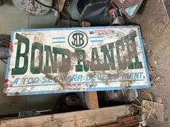 Painted wooden ranch sign