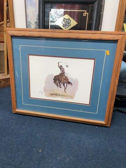Cowboy on bucking horse framed picture image