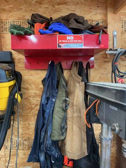 Red metal coat hanger and shelf. Includes all contents gloves, and jackets. image