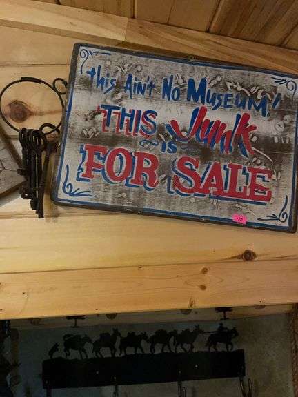 Wooden junk for sale sign, vintage key set and stirrup. image
