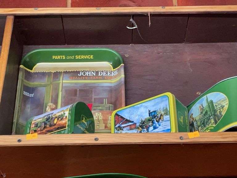 Lot of four John Deere tins image