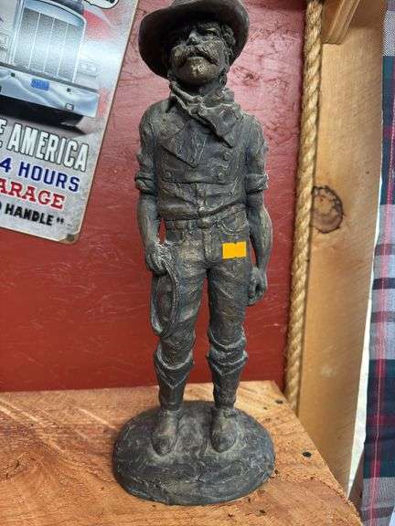 Bronze cowboy statue image