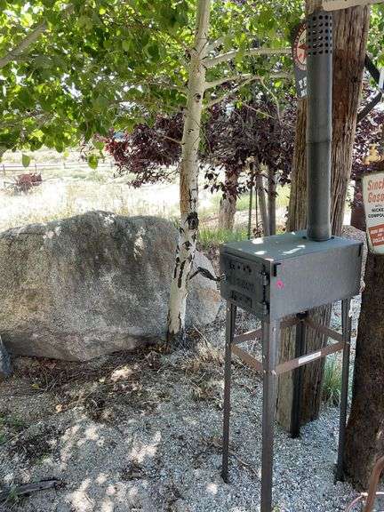 Small metal stove on stand image
