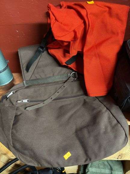Saddle bags and safety orange horse vest image