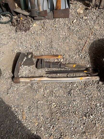 For antique tools. axe, pick, wrench and tongs image