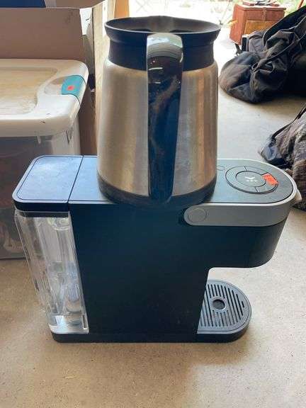 Keurig coffee maker and coffee pot image