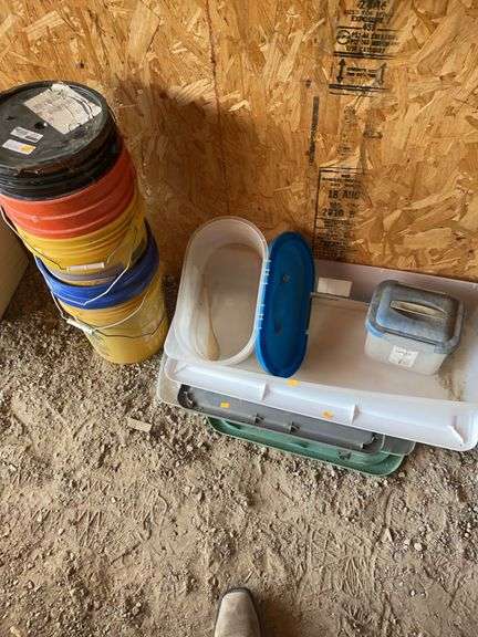 Several 5 gallon buckets, plastic containers, and lids image