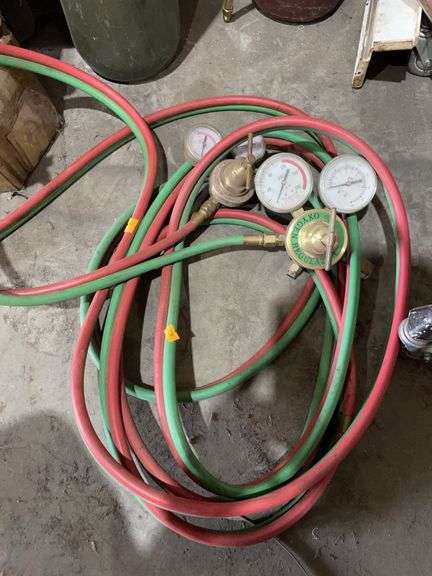 Oxygen and acetylene gauges and hose image