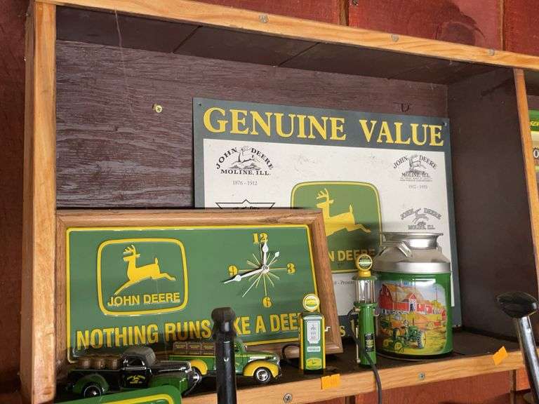Lot of seven John Deere items, diecast cars, pumps, and signs image