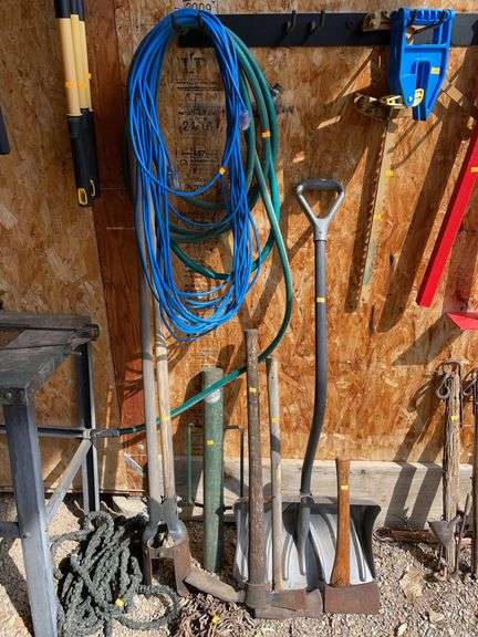 Lot of miscellaneous Yard tools, post driver, hoses, extension, cord and chains image