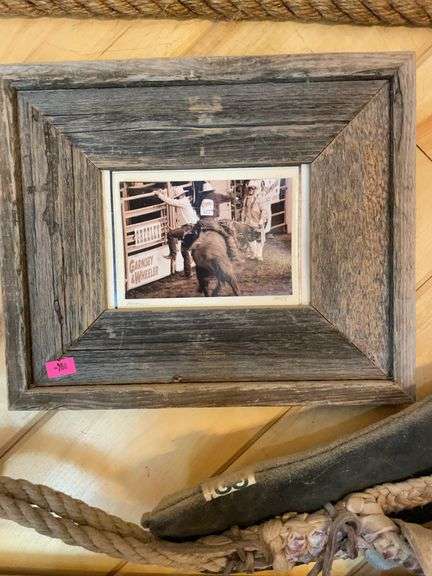 Barnwood framed bull riding picture image