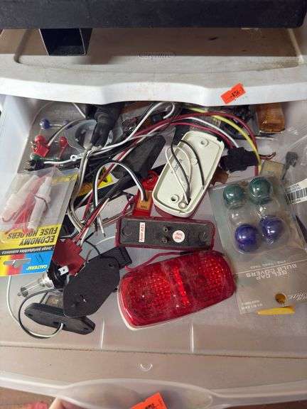 Sorted, trailer, lightbulbs, electrical, tape, lighters, and electrical connectors image