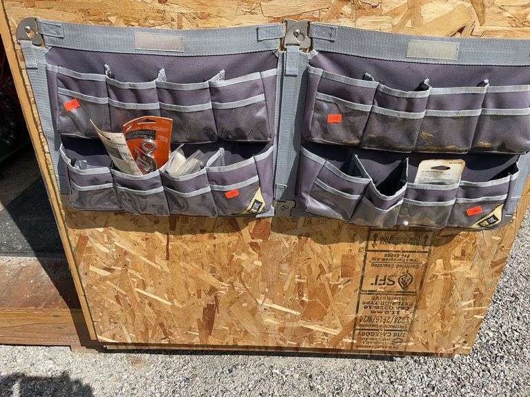 Two soft storage bins containing a little bit of hardware image