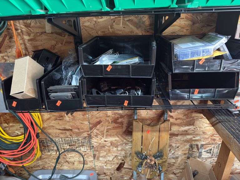 6 bins, steel base plates, tent stakes, assorted allen bolts, assorted brackets, rubber mounting pads from River seal image