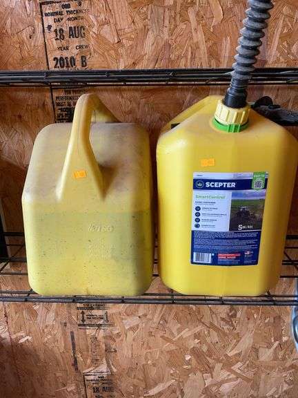 Two diesel cans w/ 5 gallons of diesel image