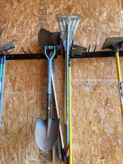 Shovels, hoe, pick, and two scrapers image