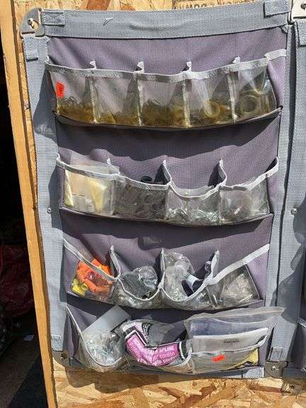 Soft storage bins with rubber, grommets, screws, wire connectors, etc. image
