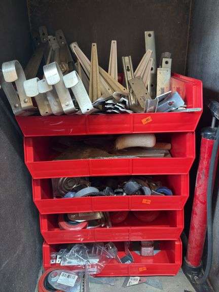Assorted shelving, brackets, casters, bicycle pump, storage bins image