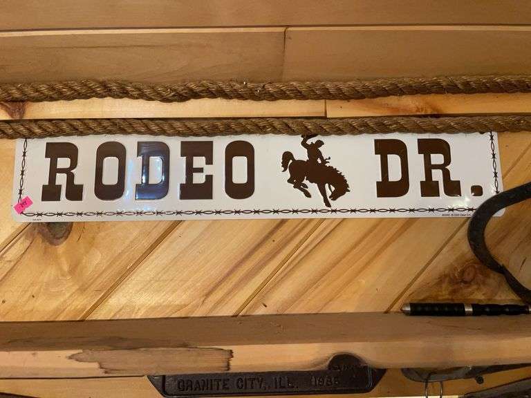 Metal novelty rodeo Drive sign image