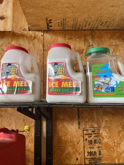 Four containers of ice melt image