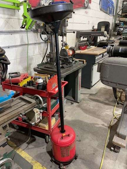 5 gallon portable oil drain dolly image