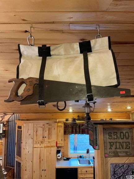 Vintage pack saddle with Panyard and hand saw image