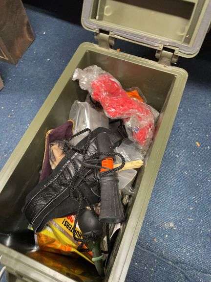 Plastic ammo box with assorted game, calls, hand warmers, etc. image