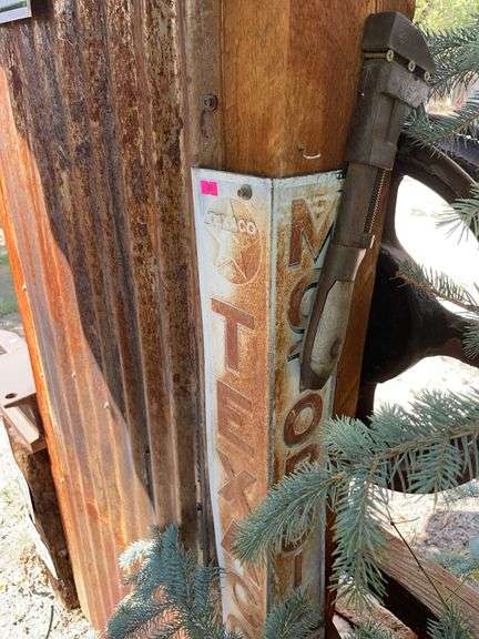 Metal sign, and antique pipe wrench image