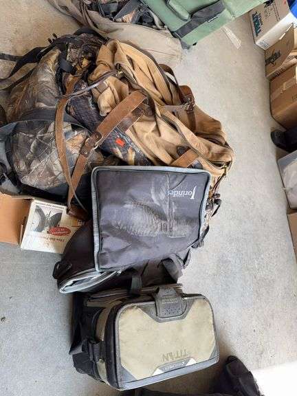 Titan lunch box and assorted camo hunting bags image