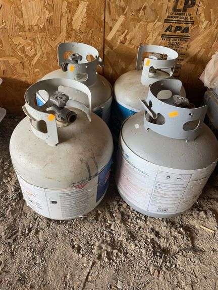 Four propane bottles image