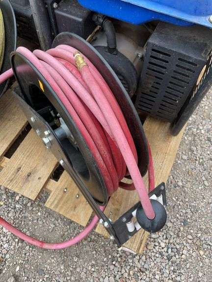 Central pneumatic retractable hose reel with 50 foot air hose image