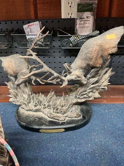 Elk fighting statue image