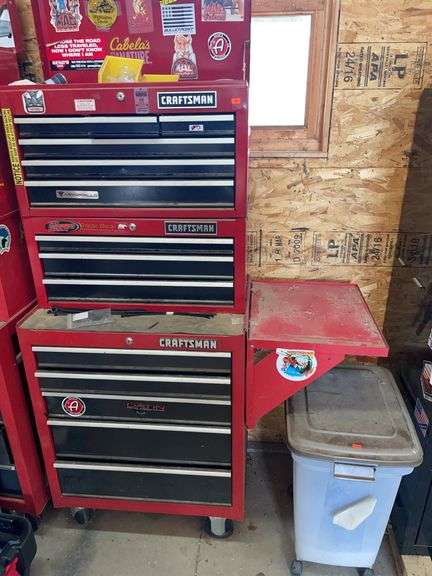 14 drawer three-piece craftsman toolbox with contents and plastic container with cat litter image