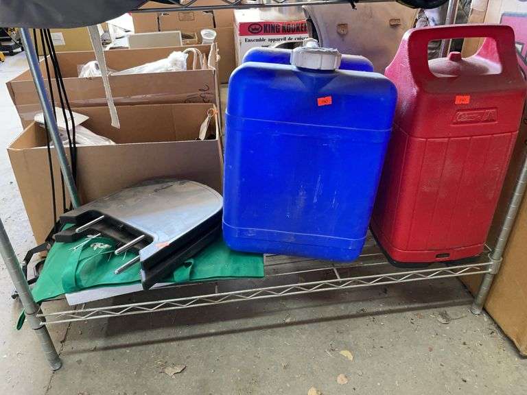Contents of four shelf. Water jug, lantern cover with lantern and miscellaneous. image