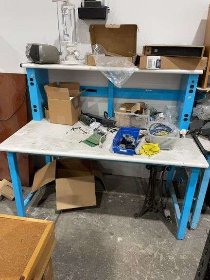 Metal table with electrical outlets (Contents Not Included) image