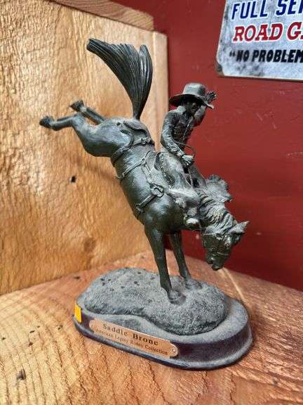 Saddle bronc bronze statue image
