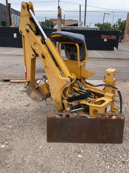 Bradco backhoe attachment and plate for quick attachment image